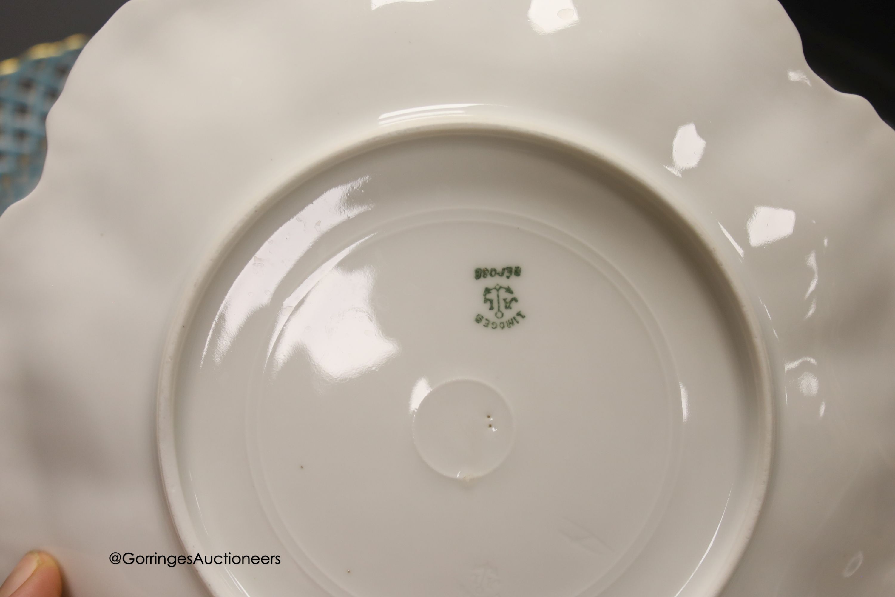 Two sets of six Limoges dessert plates, three English porcelain ribbon plates, an Alfred Pearce Aynsley dessert plate and a Worcester cup and saucer